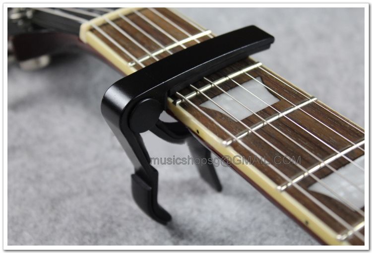 Guitar Capo photo T2YOqlXaFaXXXXXXXX_3765966292_zps38d49d32.jpg